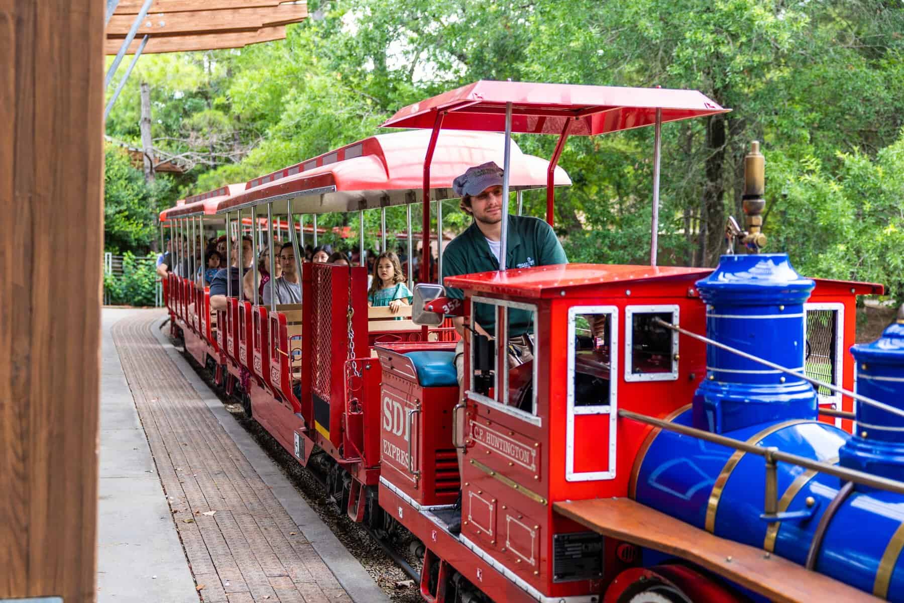 Hermann Park Railroad miniature train winding through the green park in Houston