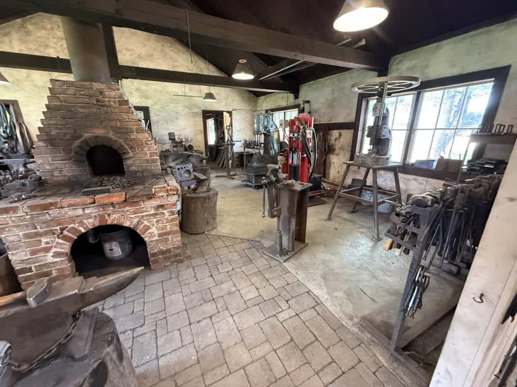 Blacksmith shop with wood-fired forge at Homestead Heritage near Waco, Texas
