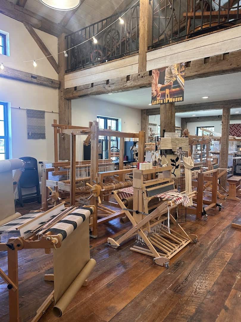 Weaving looms in the fiber crafts cottage at Homestead Heritage near Waco, Texas