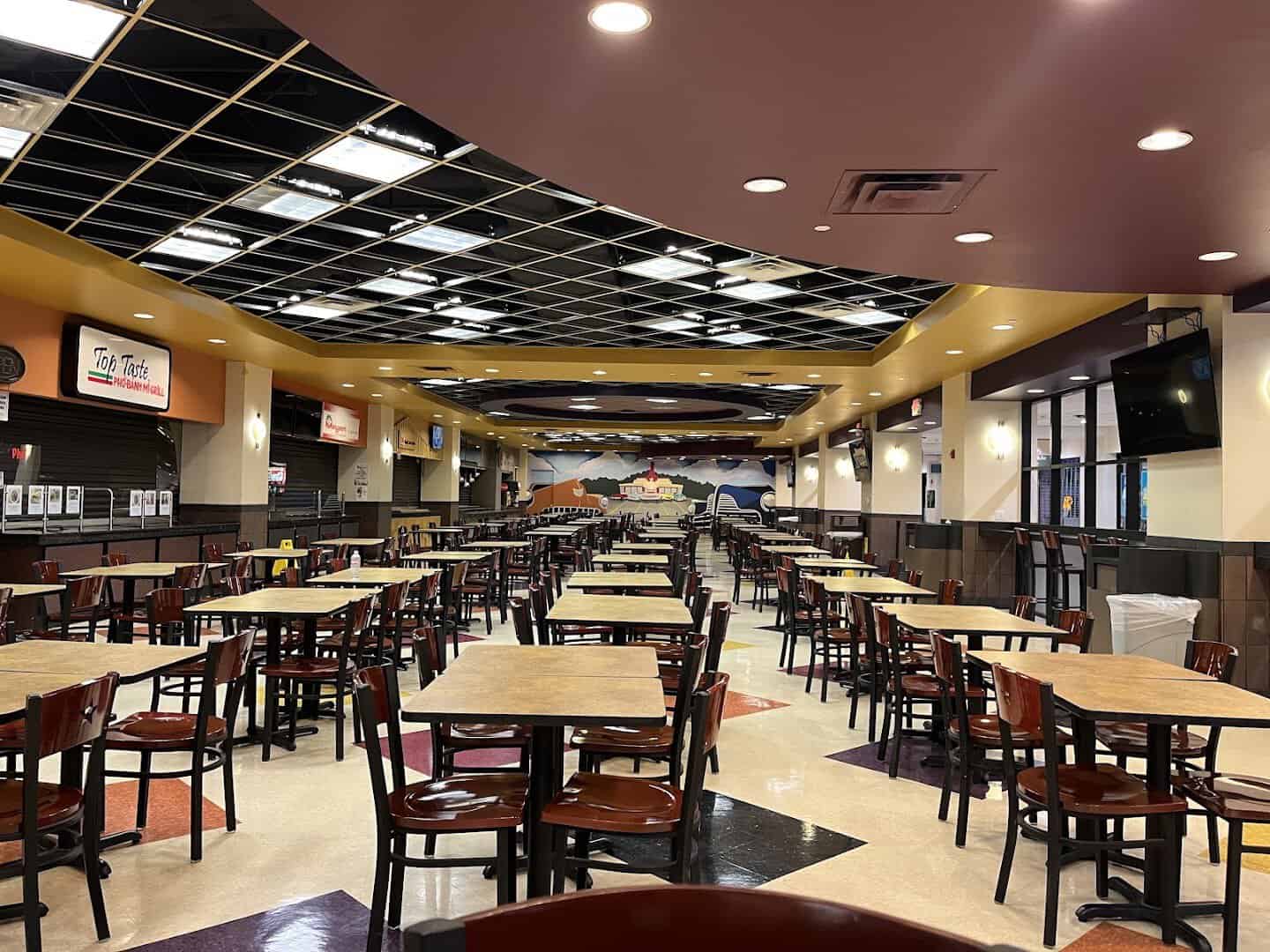 Underground food court with dining tables in the Houston tunnels