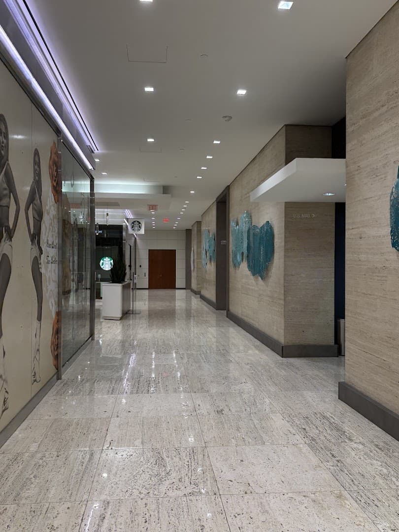 Bright marble corridor with wall art in Houstons downtown tunnels