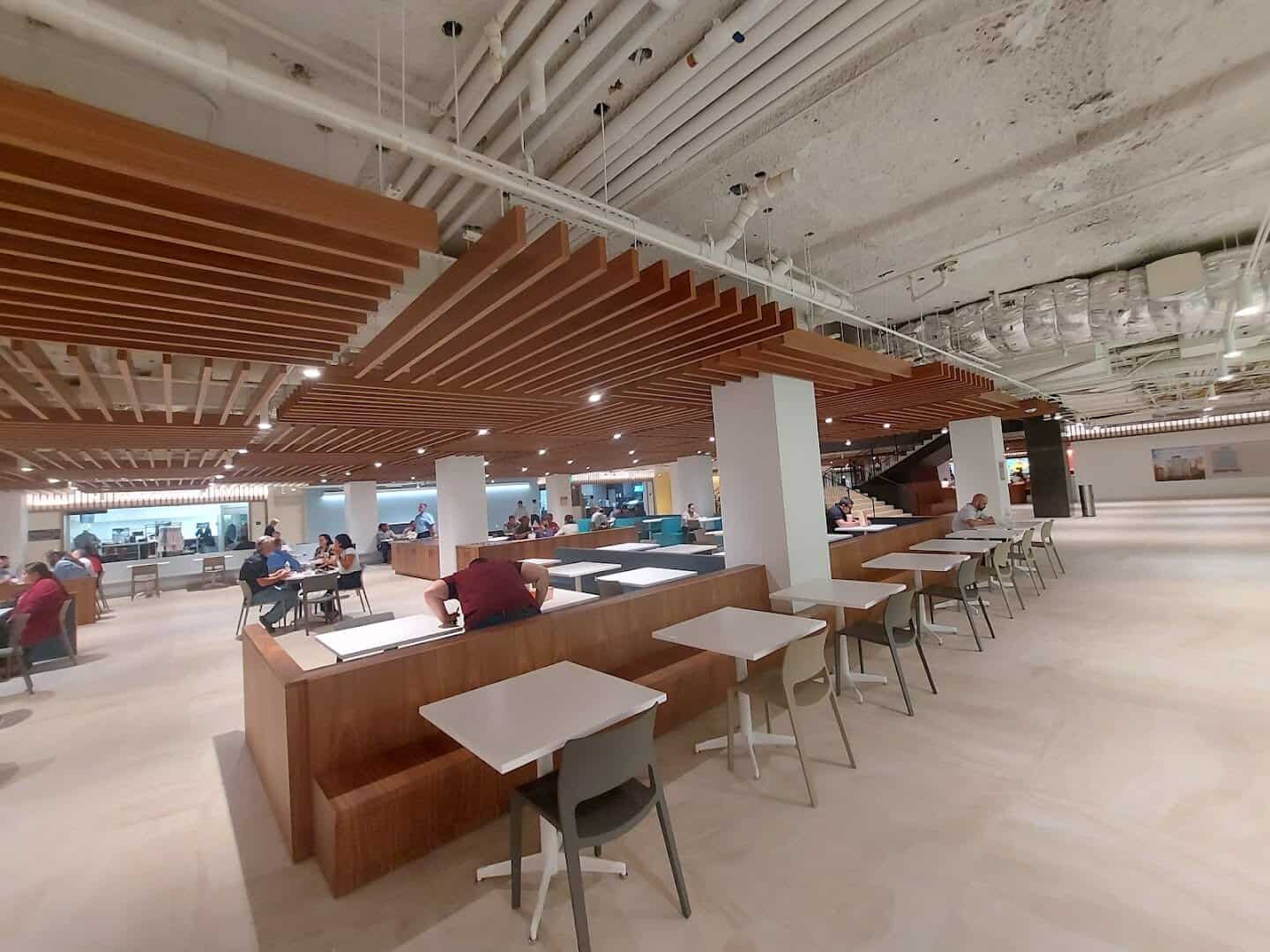 Contemporary dining area with a wood-slat ceiling in Houstons tunnels