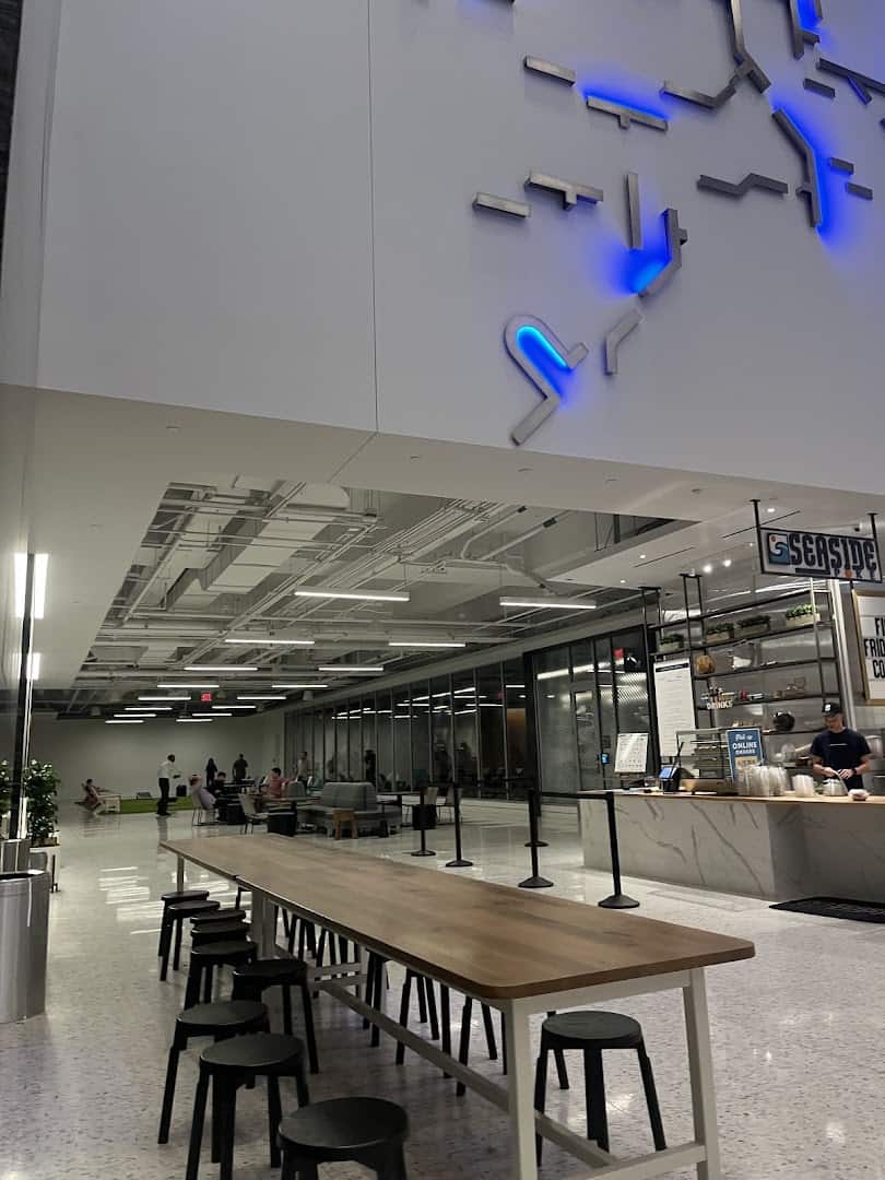 Modern food hall with a communal table in the Downtown Houston Tunnel System