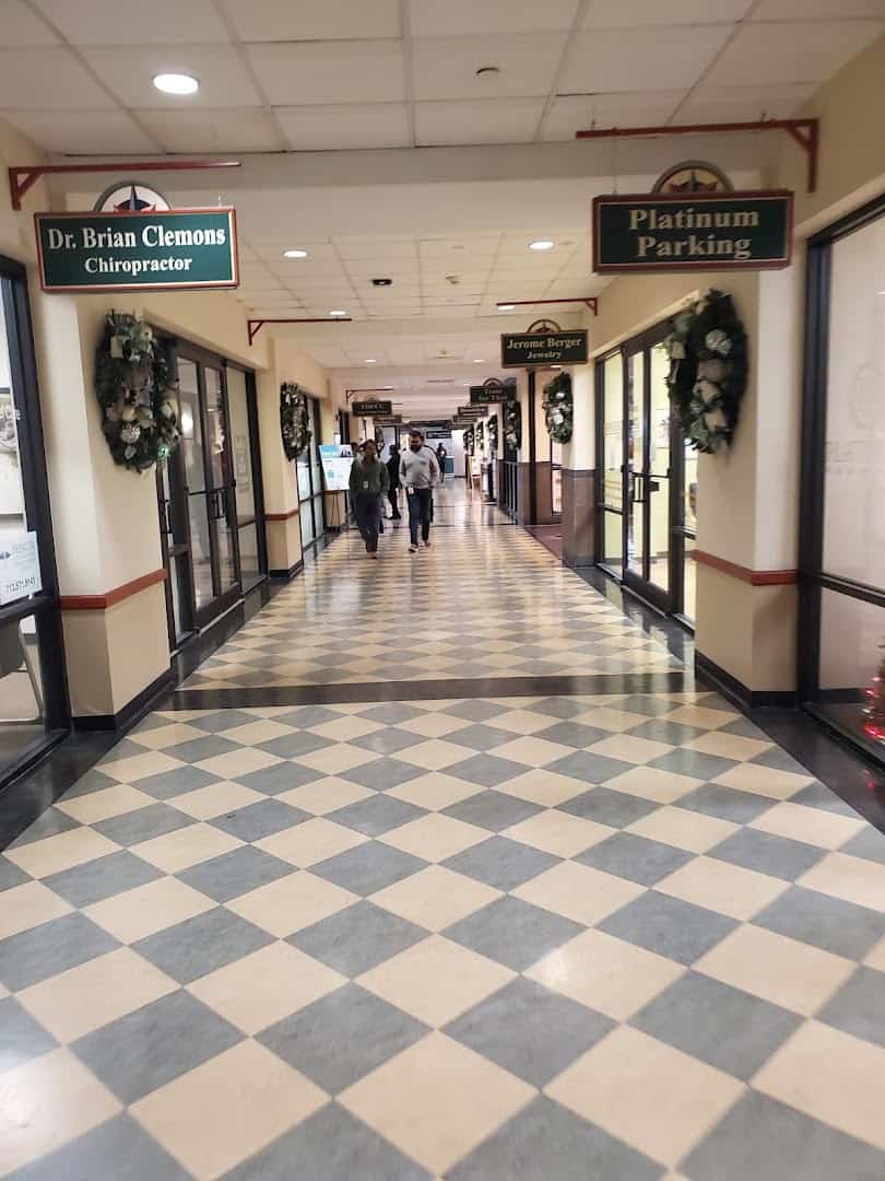 Checkerboard-floor walkway lined with shops in the Downtown Houston Tunnel System