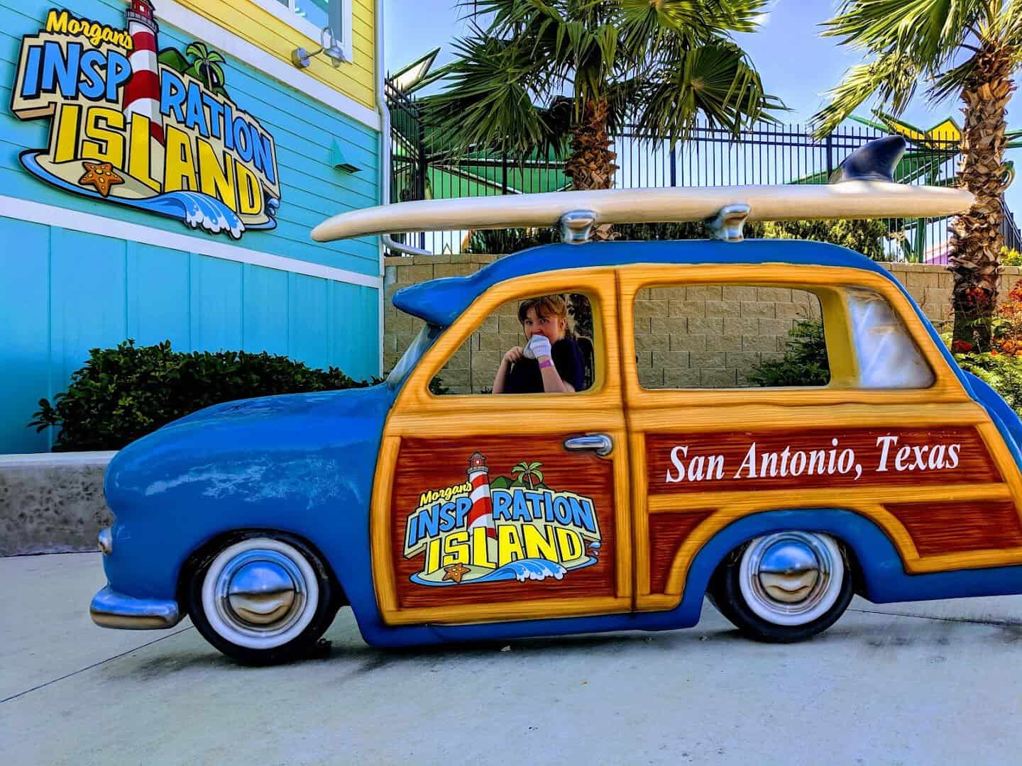 Morgan's Inspiration Island themed woody car photo prop in San Antonio, Texas
