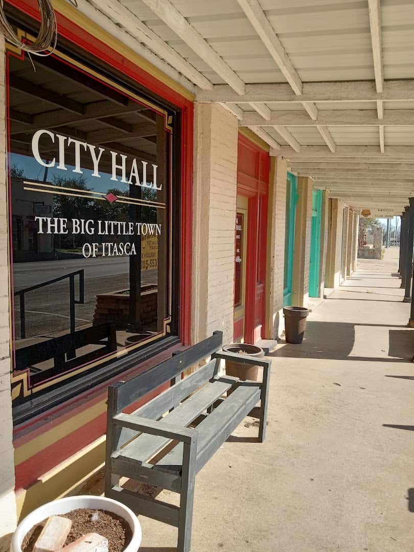 City Hall mural naming Itasca the Big Little Town, at Olde Towne Country Store in Itasca, Texas