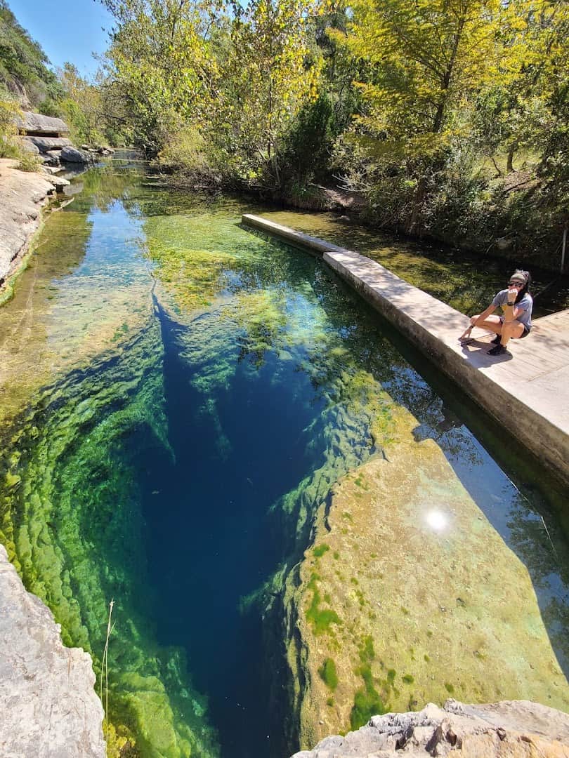 The deep blue mouth of Jacob's Well artesian spring in Wimberley, Texas