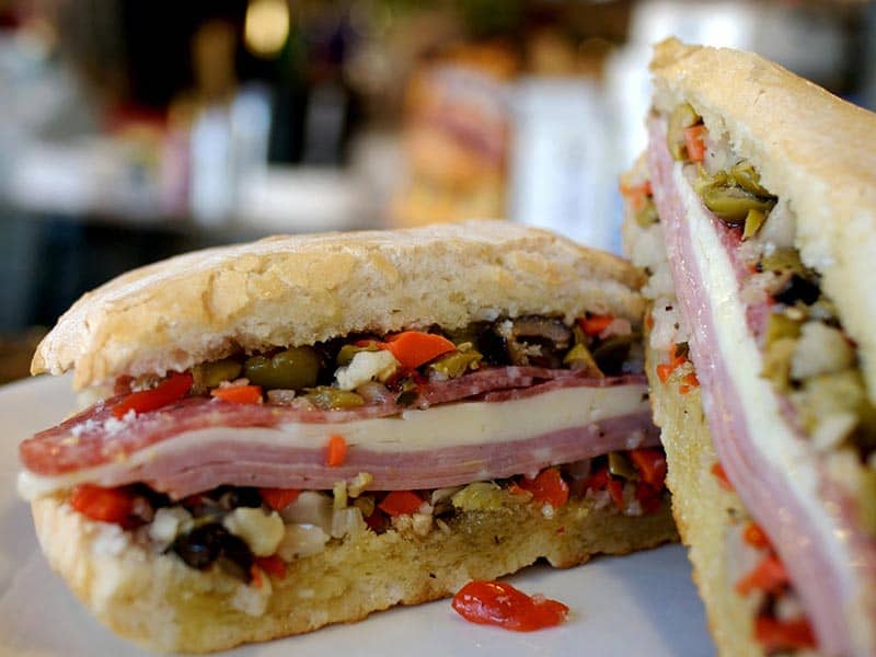 A muffuletta with salami, ham, provolone and olive salad at Jimmy's Food Store in Dallas