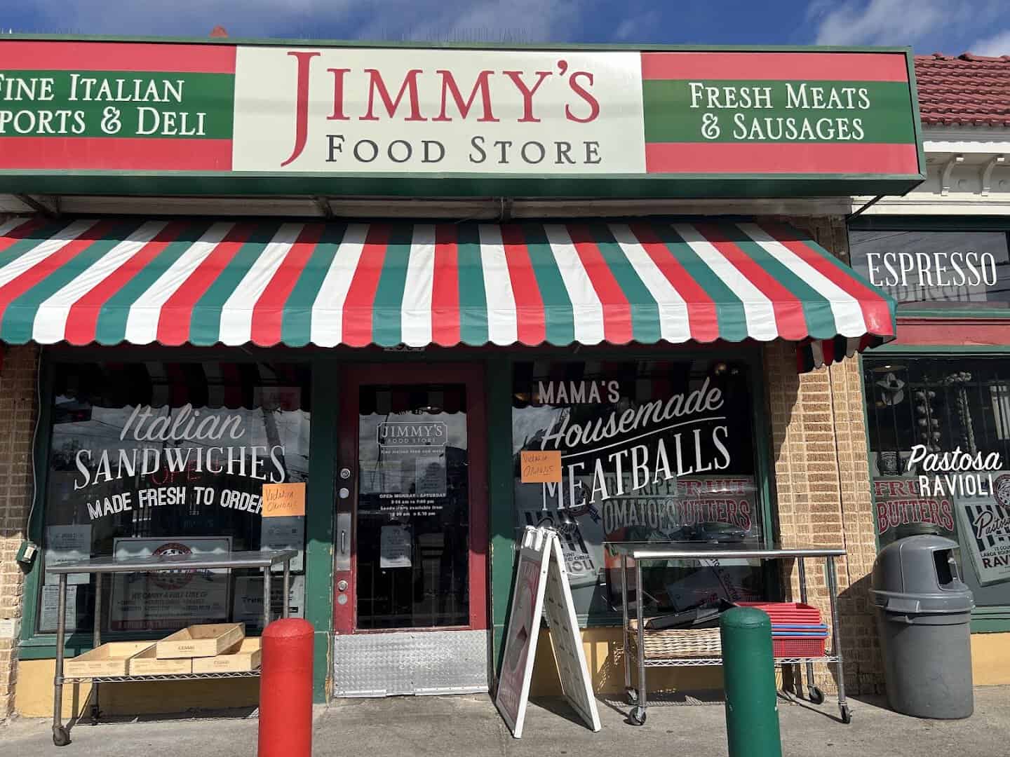 Striped awning and storefront of Jimmy's Food Store in Dallas