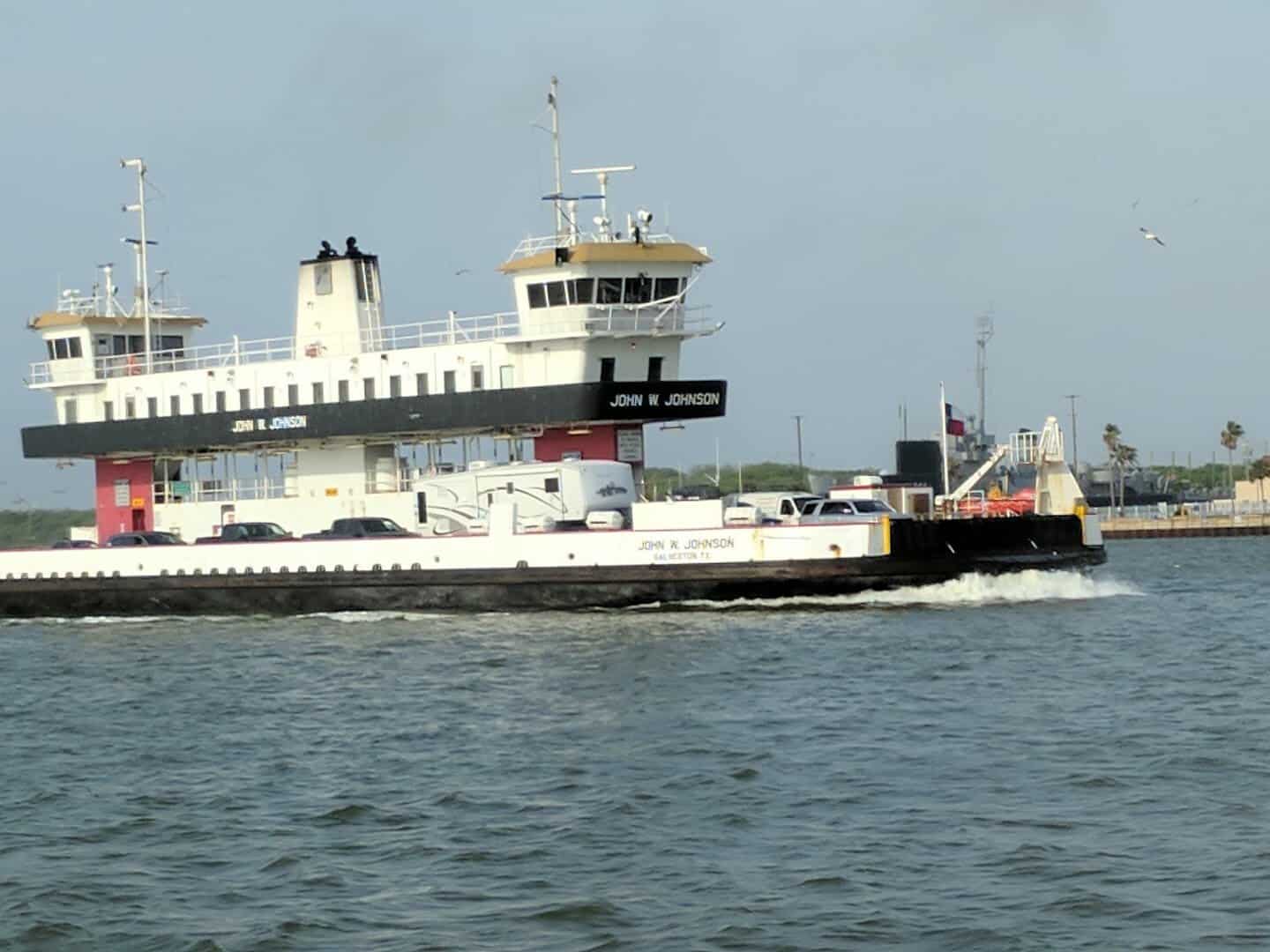 The John W. Johnson ferry underway near Galveston with its name painted on the side