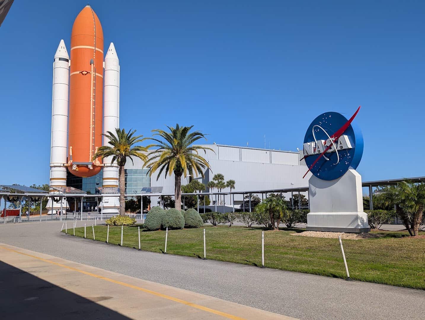 Space shuttle stack and NASA sign at Kennedy Space Center, Florida