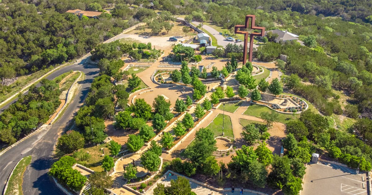 Hilltop gardens and the giant Empty Cross at the Coming King Sculpture Prayer Garden near Kerrville, Texas