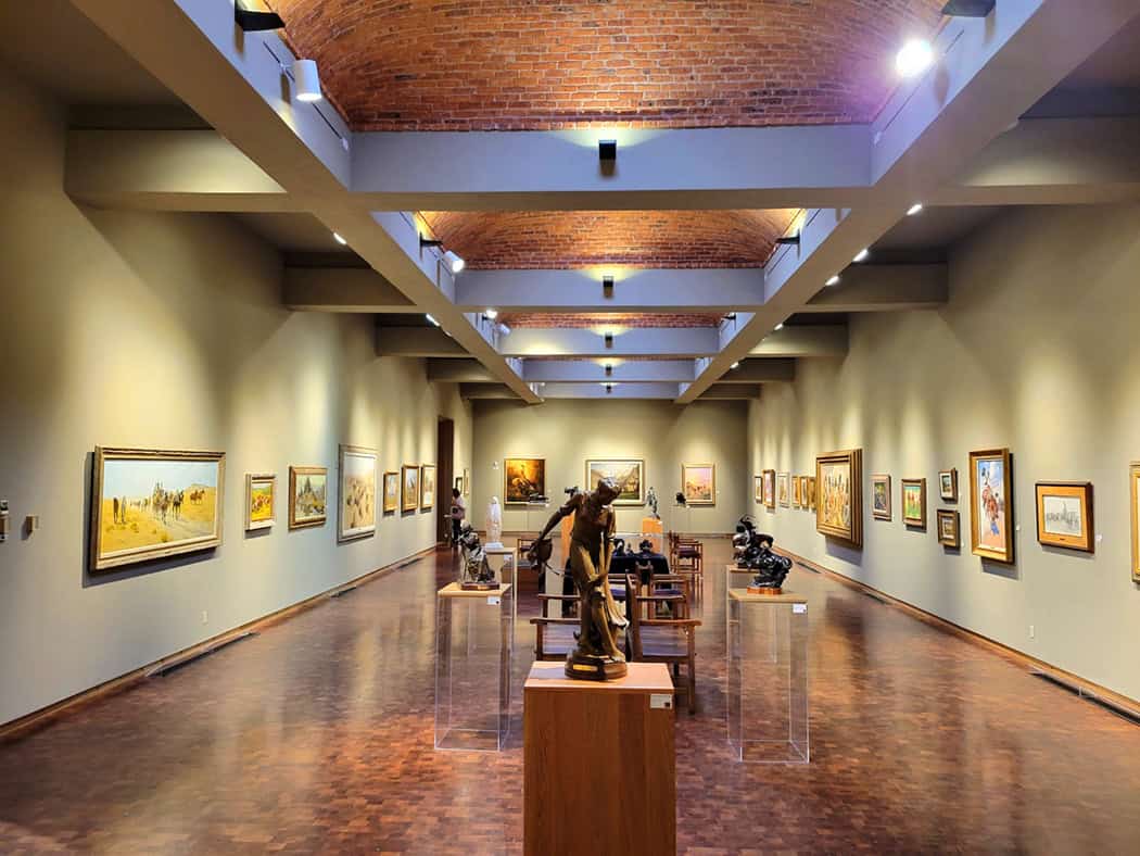 Gallery with a vaulted brick ceiling at the Museum of Western Art in Kerrville