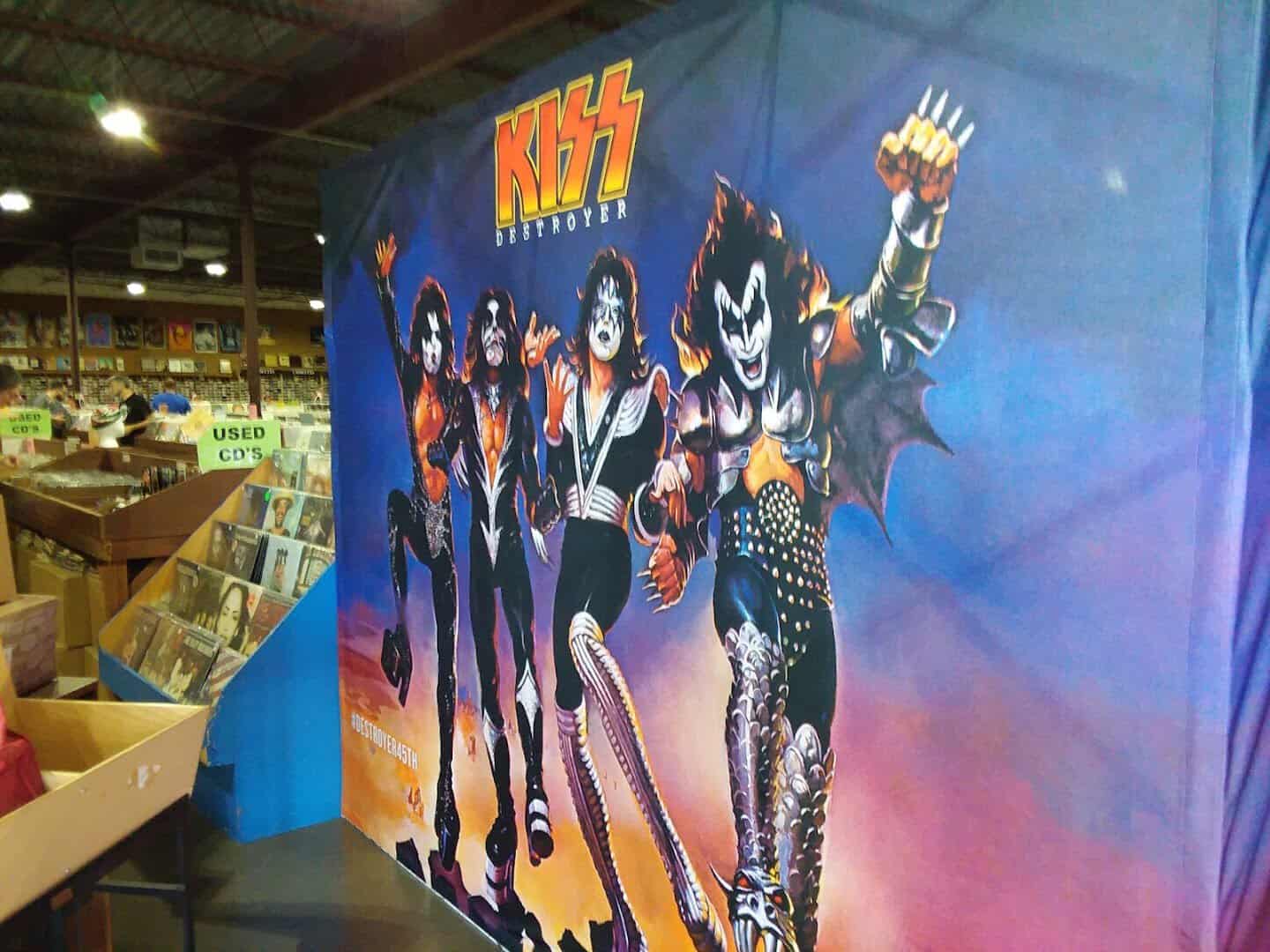 KISS album wall art and music memorabilia at Forever Young Records in Grand Prairie, Texas