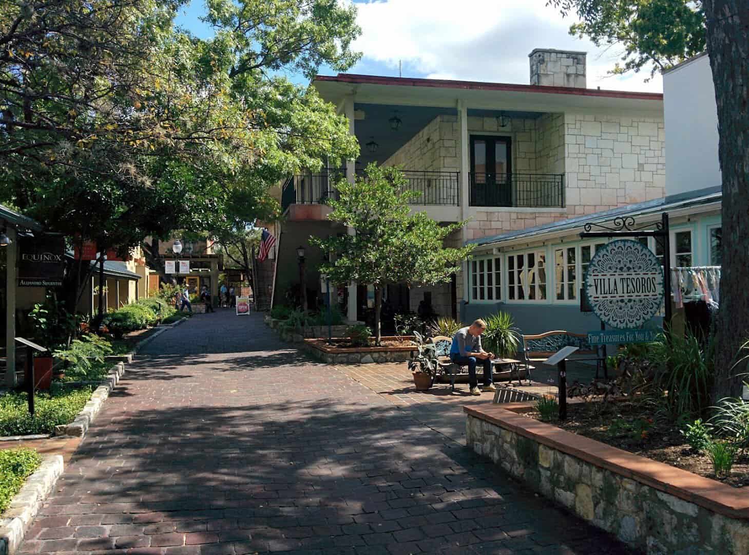 Cobblestone lane lined with shops at La Villita in San Antonio