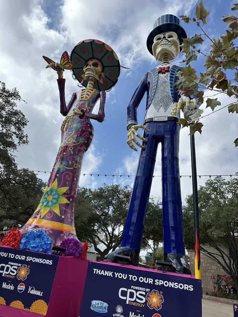 Giant colorful catrina sculptures during Fiesta at La Villita in San Antonio
