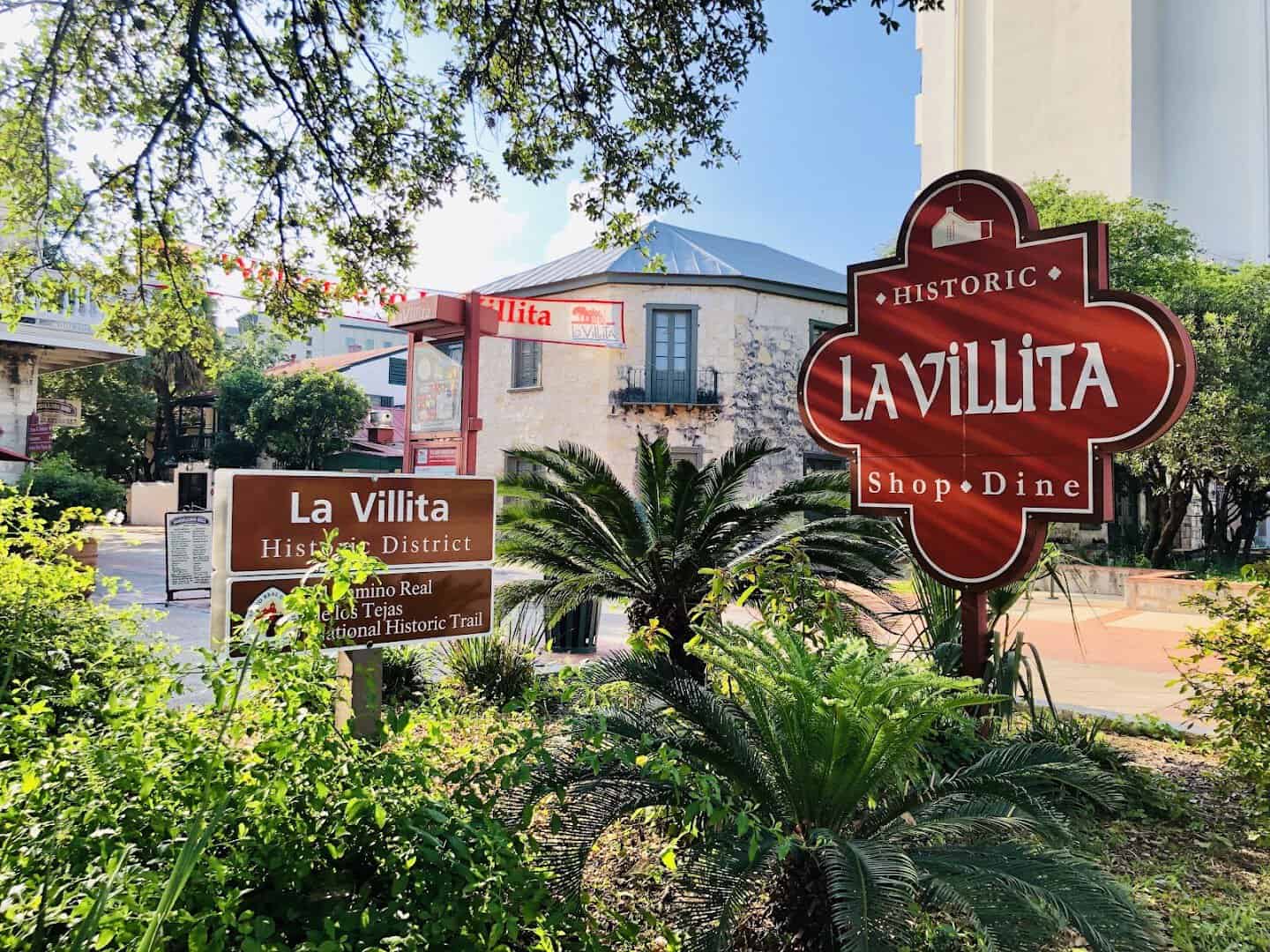 Historic La Villita village sign and landscaping in San Antonio