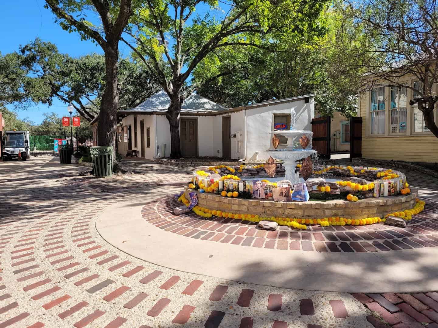 Fountain and flowers in a shaded plaza at La Villita in San Antonio