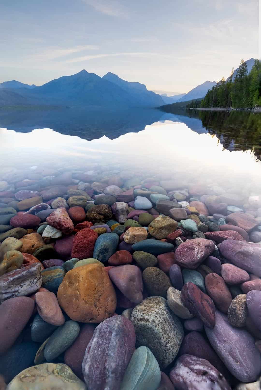 Colored pebbles beneath the clear water of Lake McDonald, Glacier National Park, Montana