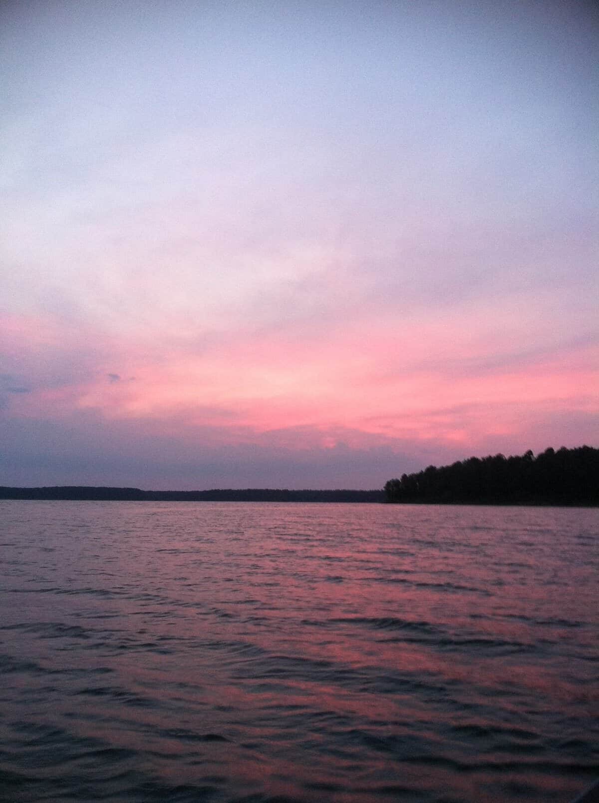 Pink sunset over the water at Lake O' the Pines, Texas