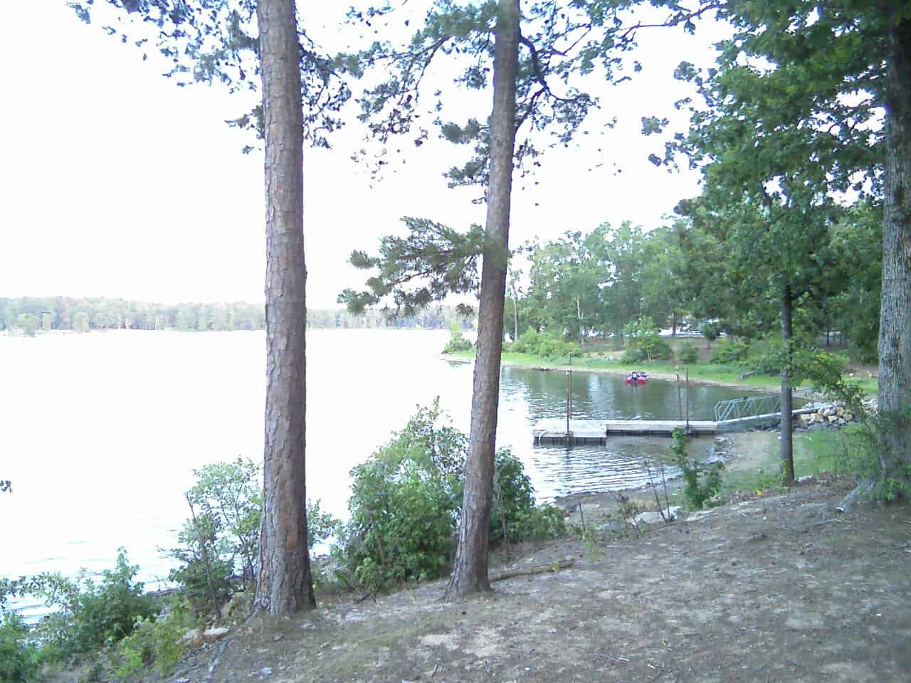 Wooded shoreline and dock at Lake O' the Pines in the East Texas Piney Woods