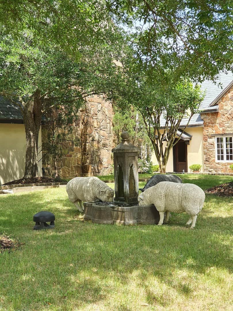 Sculptures on the tree-shaded lawn at the Lanier Theological Library in Houston, Texas