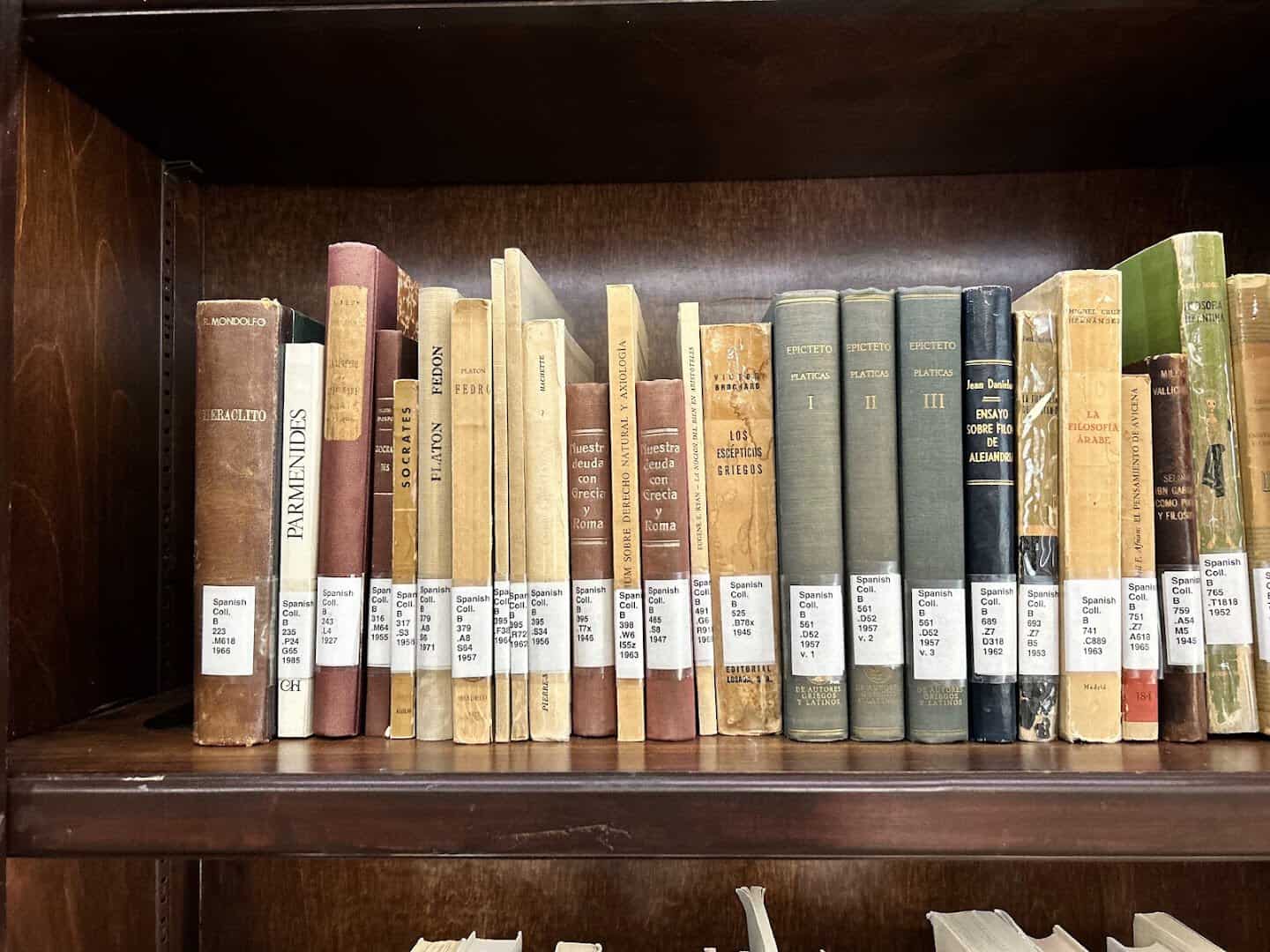 Shelves of scholarly volumes with Library of Congress call numbers at the Lanier Theological Library in Houston