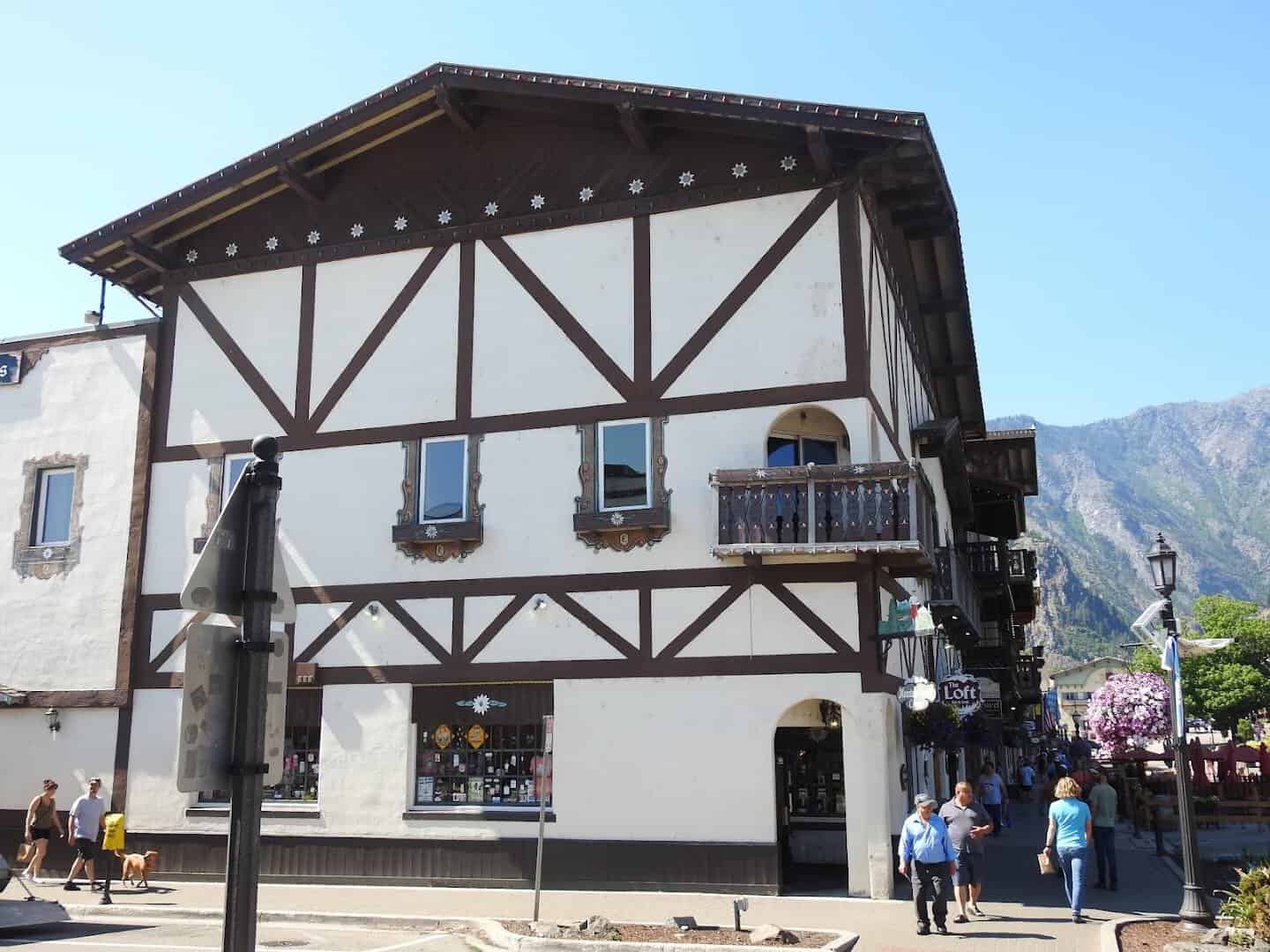 Half-timbered Bavarian building below the mountains in Leavenworth, Washington