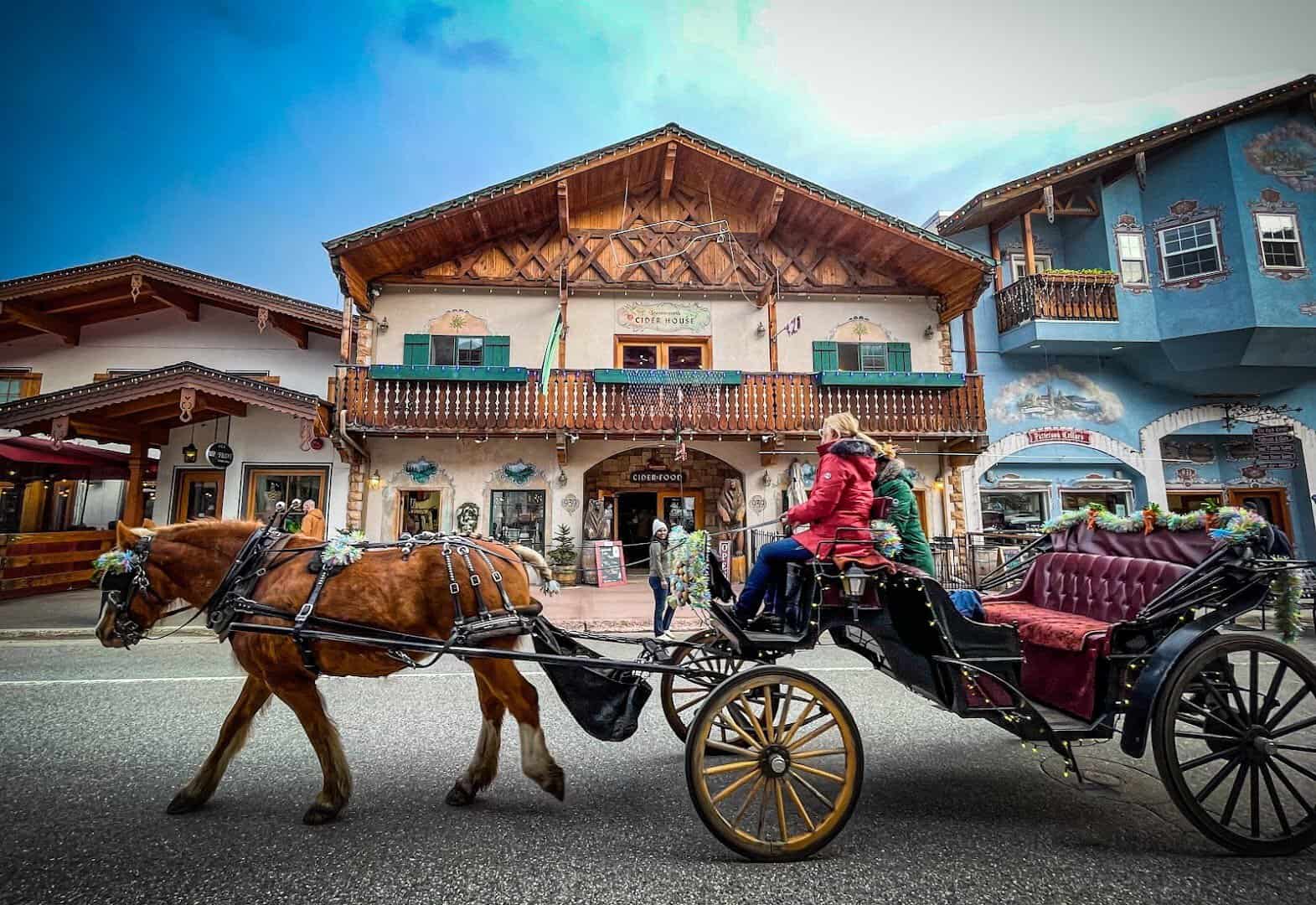 Bavarian-style buildings and a horse-drawn carriage in Leavenworth, Washington