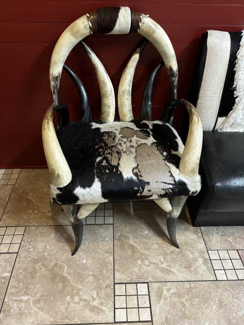 Longhorn horn chair with cowhide in the dining room at Ranchero King Buffet in Houston