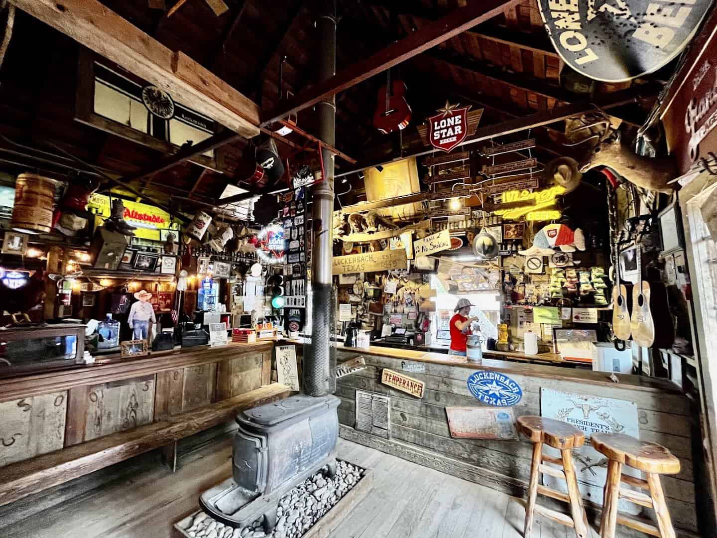 The bar inside the Luckenbach general store with walls of memorabilia