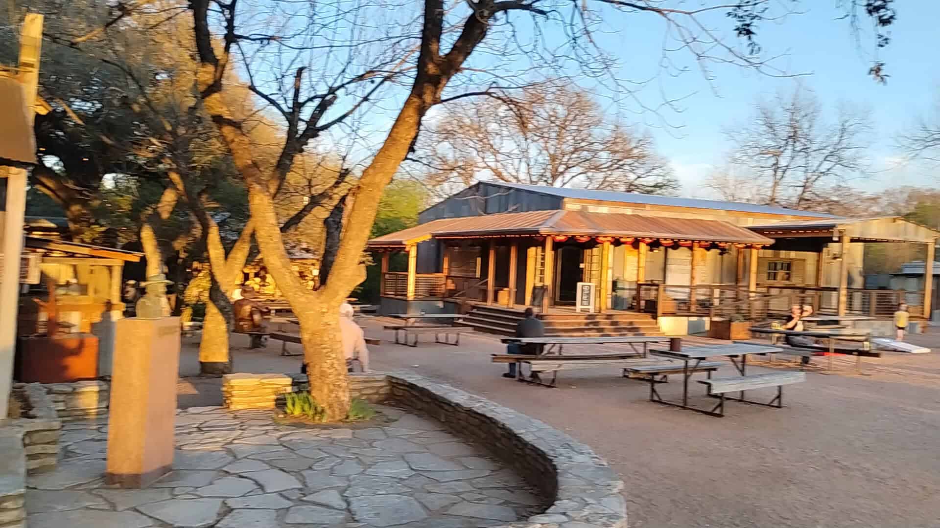 Courtyard and picnic tables under the oaks at Luckenbach Texas