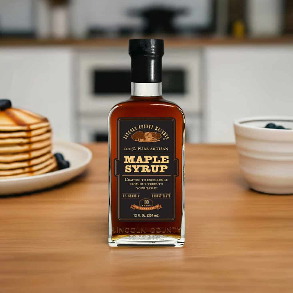 Bottle of pure maple syrup with pancakes at Veal Station Amish Market