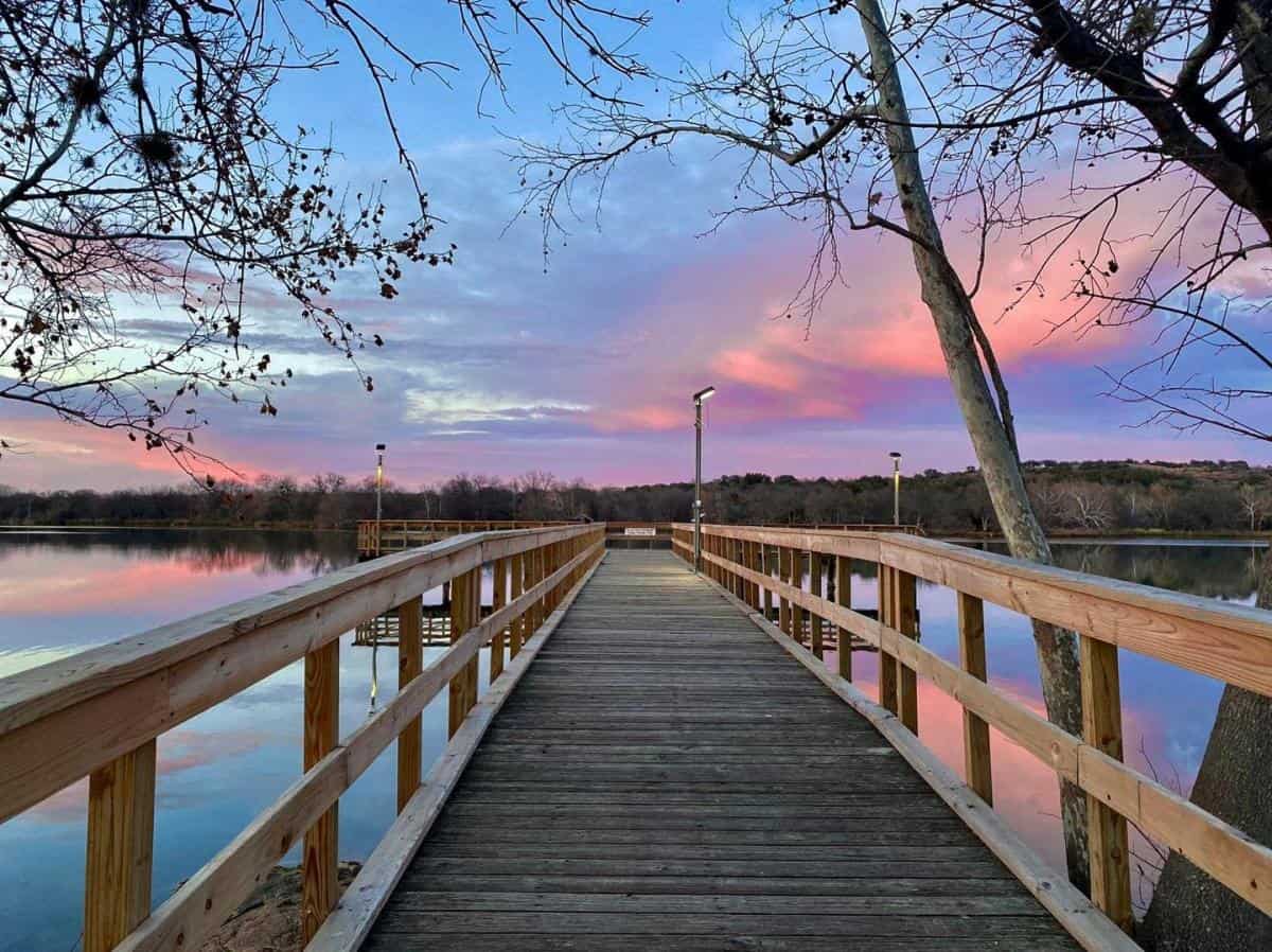 Pier over Lake Marble Falls at sunset in Marble Falls, Texas