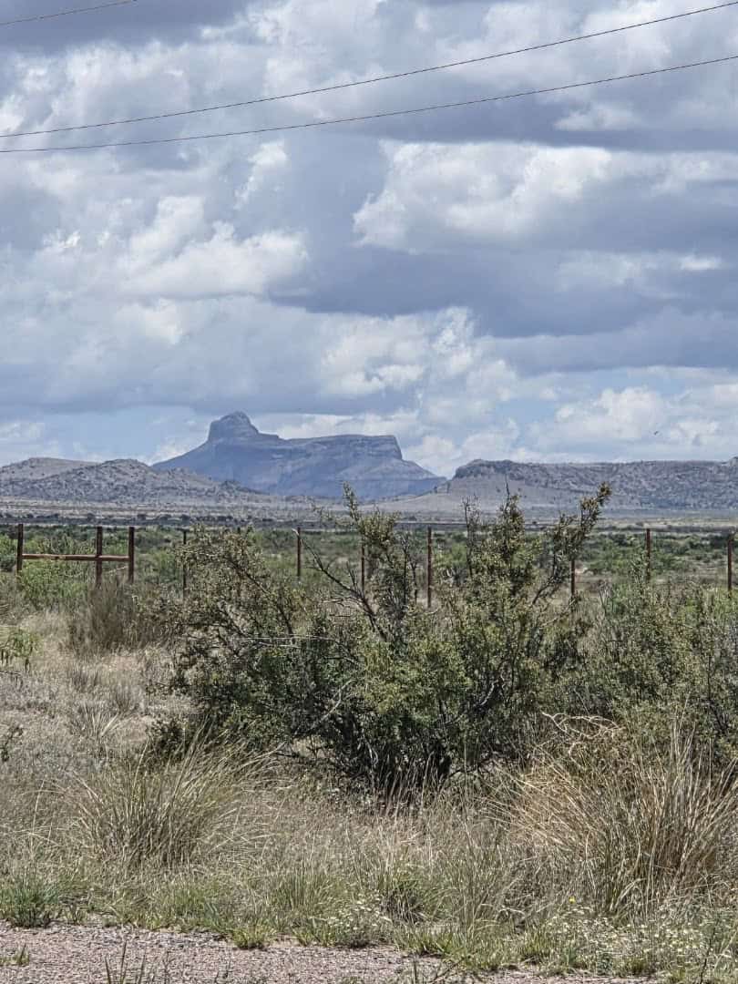 Wide desert plain and distant mountains seen from the Marfa Lights viewing area