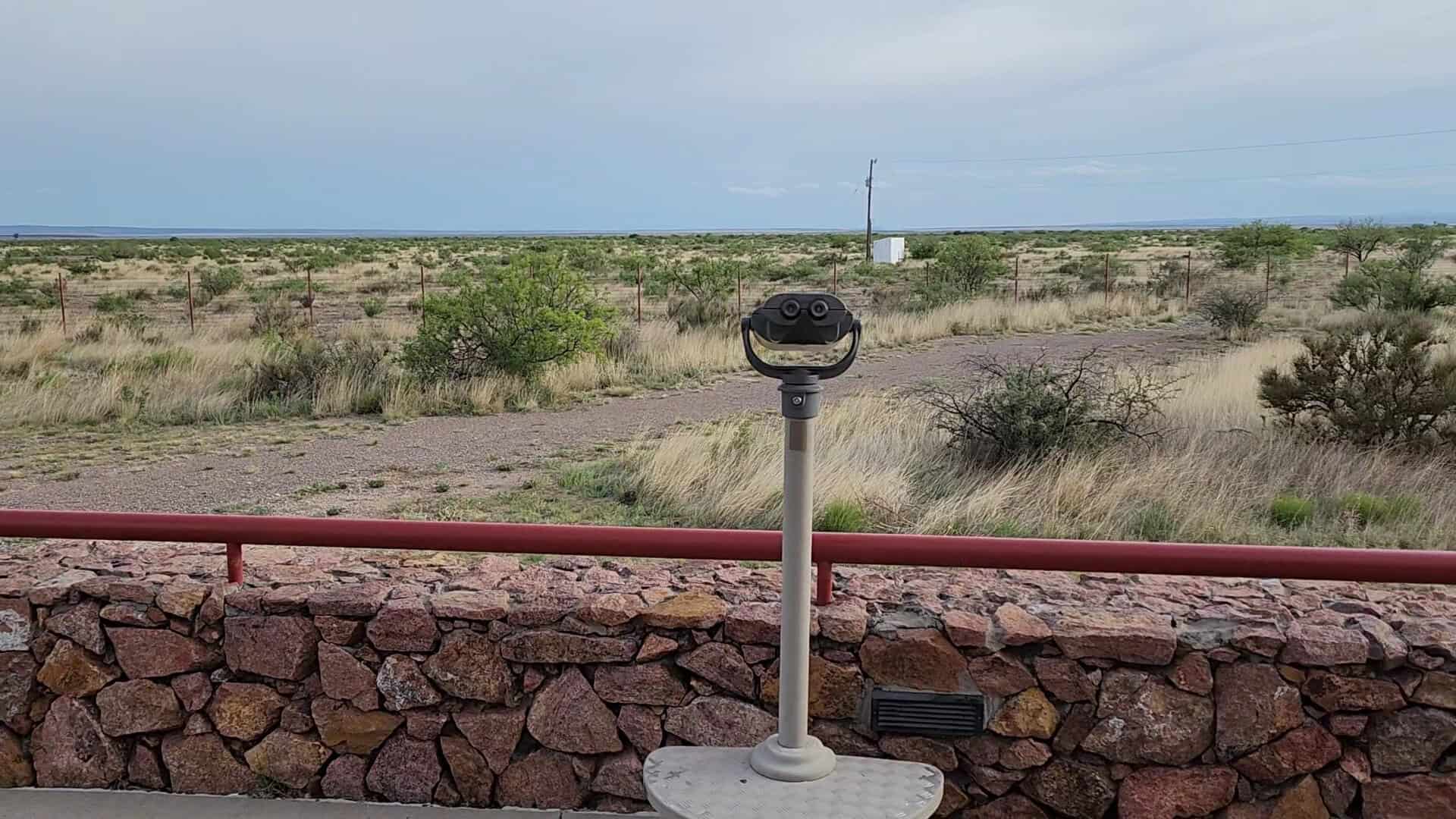 Mounted binoculars pointed at the desert horizon at the Marfa Lights viewing area