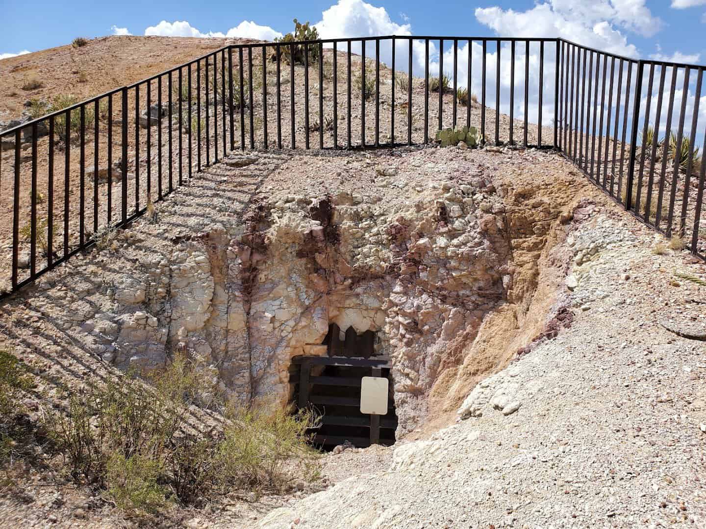 Fenced mine shaft on the upper trail at Mariscal Mine in Big Bend