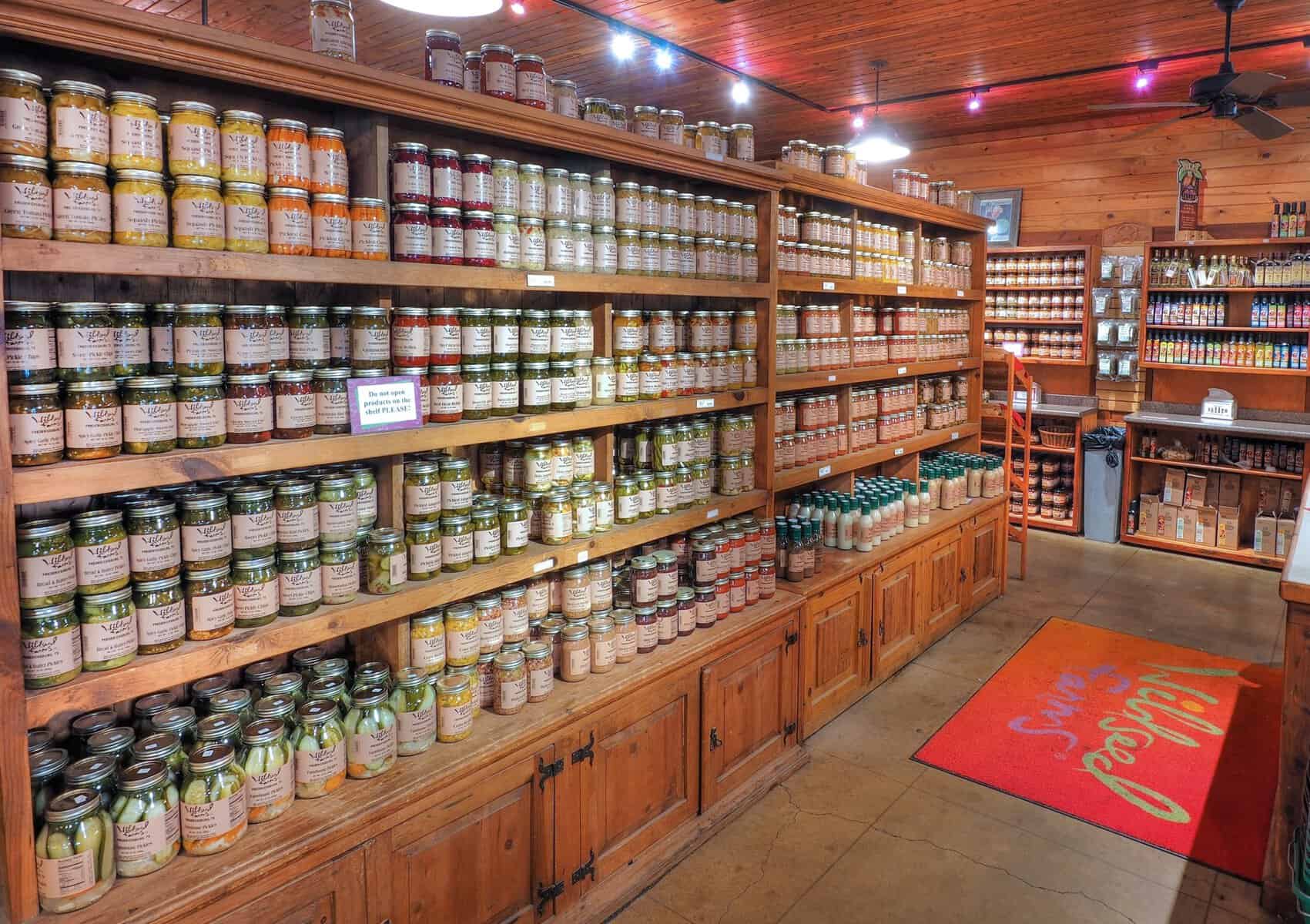 Shelves of jarred Texas foods in the Market Center store at Wildseed Farms