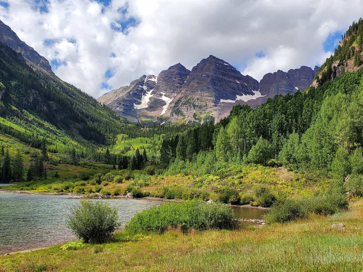 The bell-shaped Maroon Bells peaks above Maroon Lake near Aspen, Colorado