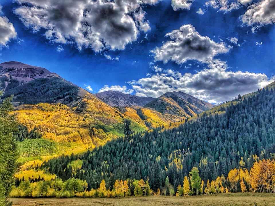 Golden aspens below the Maroon Bells peaks near Aspen, Colorado in fall