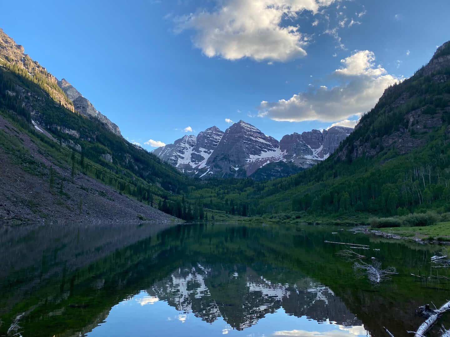 The twin Maroon Bells peaks reflected in Maroon Lake near Aspen, Colorado