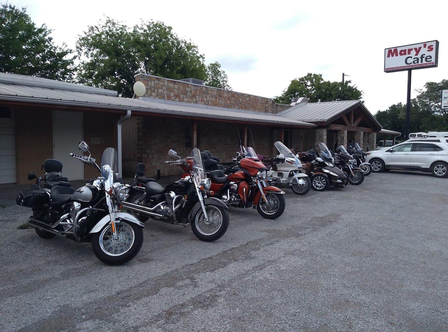 The exterior of Mary's Cafe and its sign in Strawn, Texas