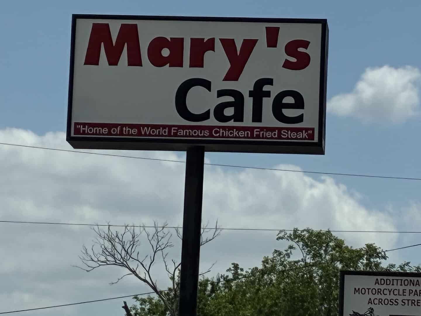 Mary's Cafe road sign in Strawn, Texas reading Home of the World Famous Chicken Fried Steak