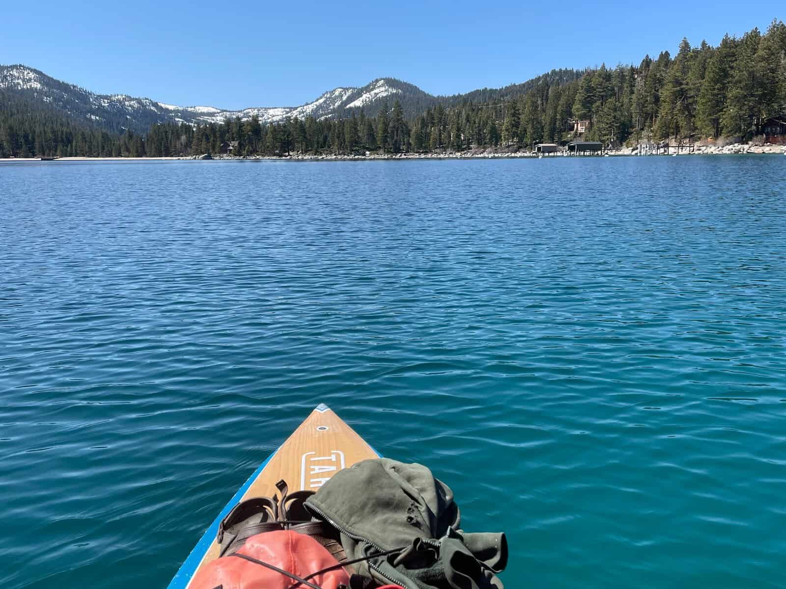 Kayaking on the calm, clear water at Meeks Bay, Lake Tahoe, California