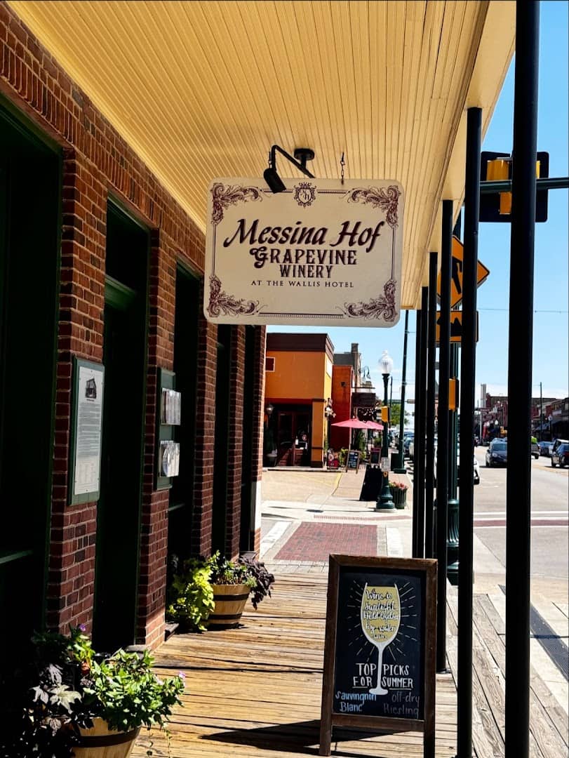 Messina Hof Grapevine Winery sign on historic Main Street in Grapevine, Texas