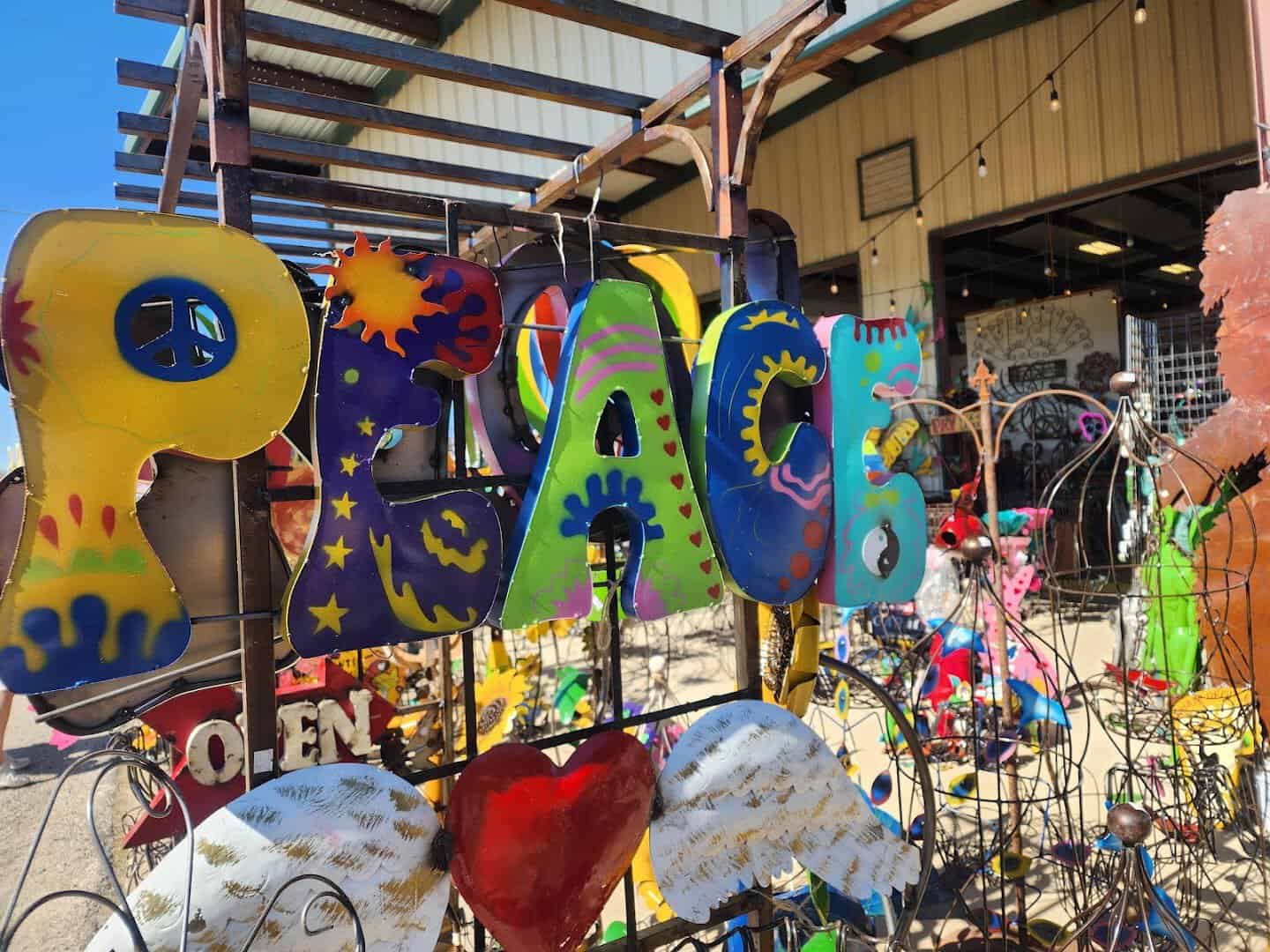 Painted metal yard art for sale at First Monday Trade Days in Canton