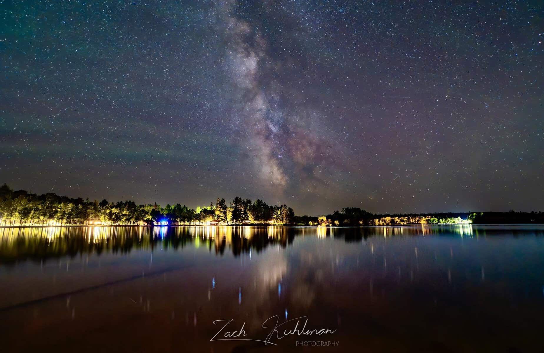 The Milky Way reflected over Rainy Lake at Voyageurs National Park, Minnesota
