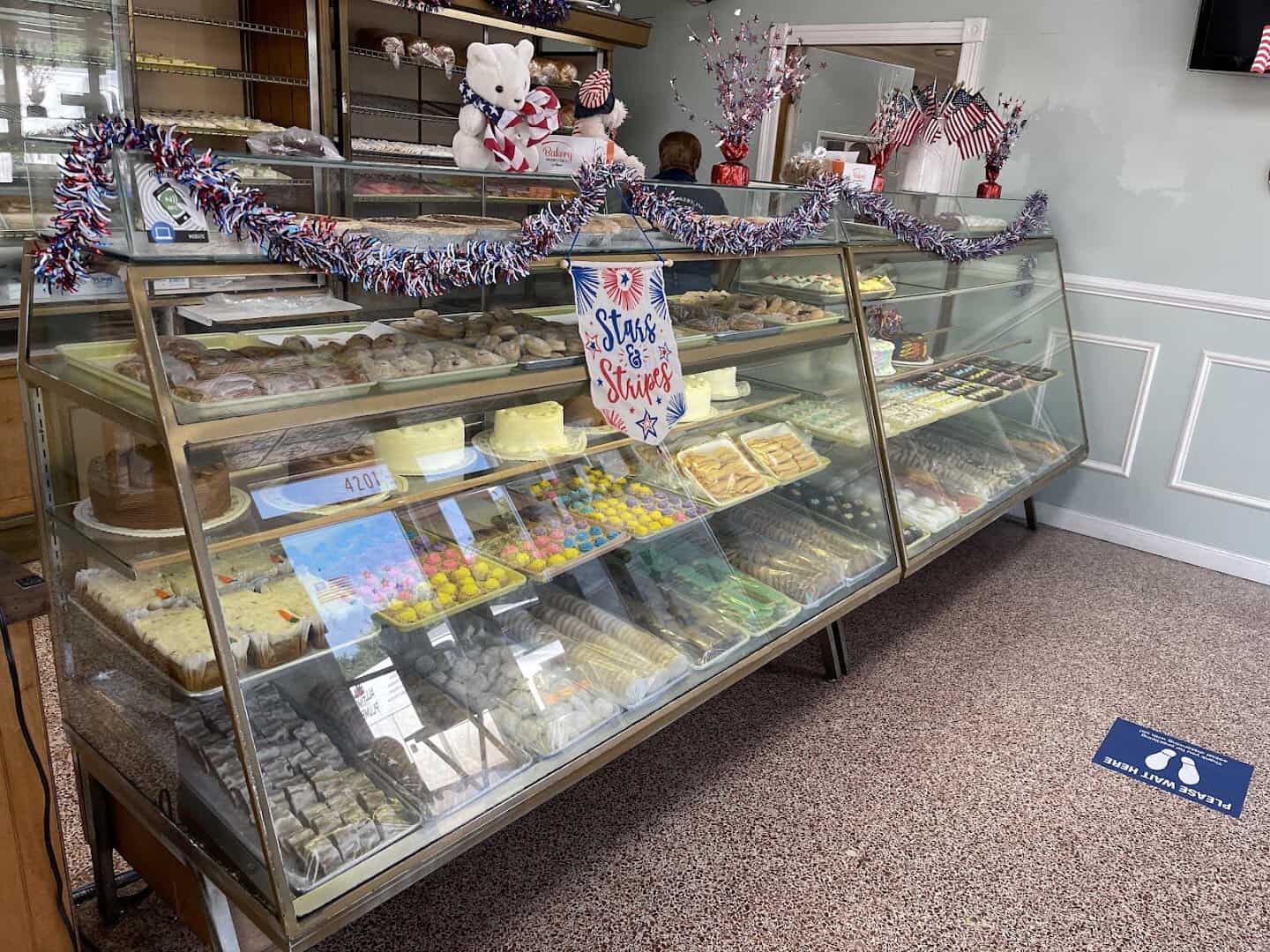 Inside Moeller's Bakery in Houston, lined with display cases
