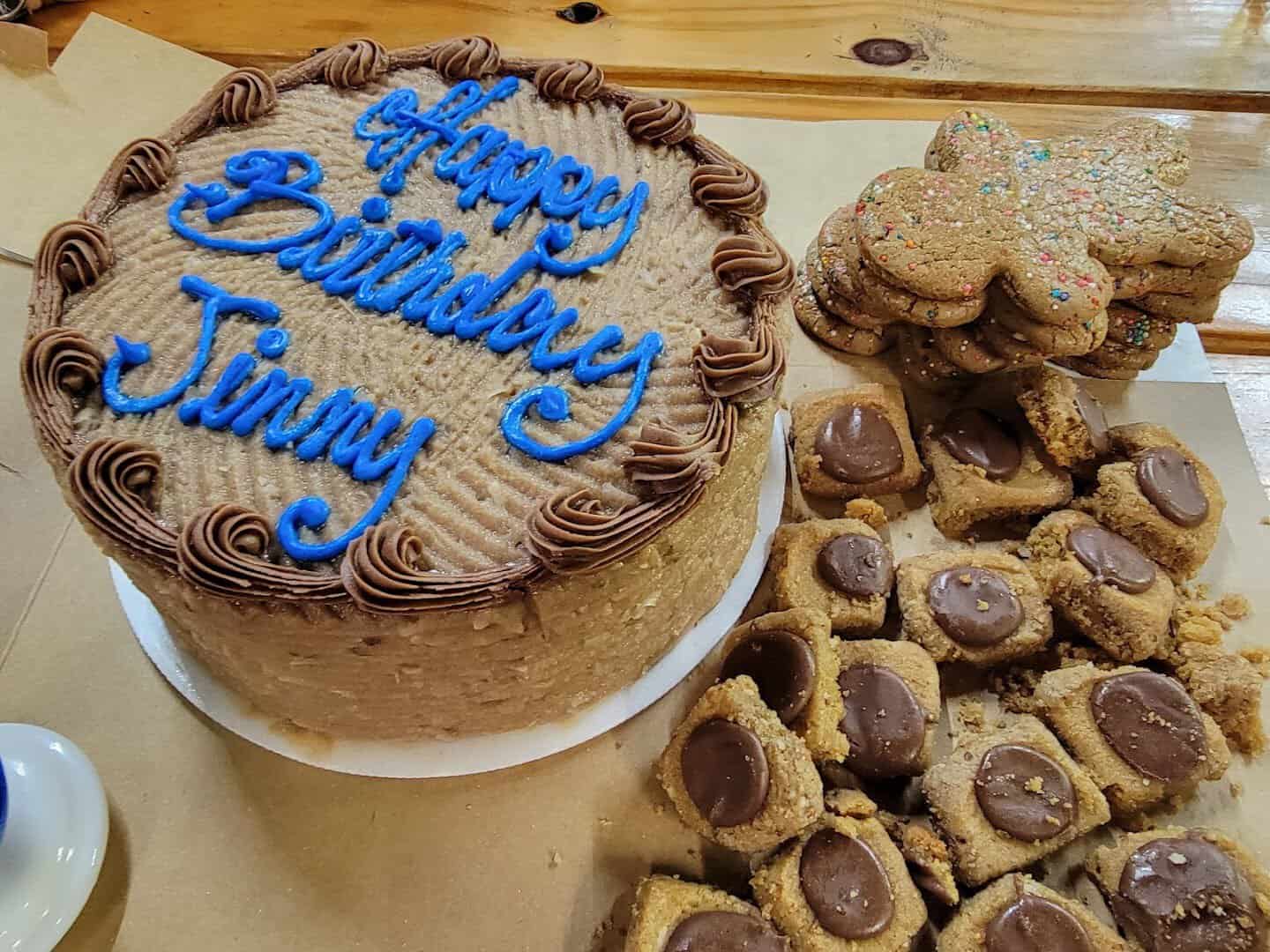 A decorated Happy Birthday layer cake at Moeller's Bakery in Houston