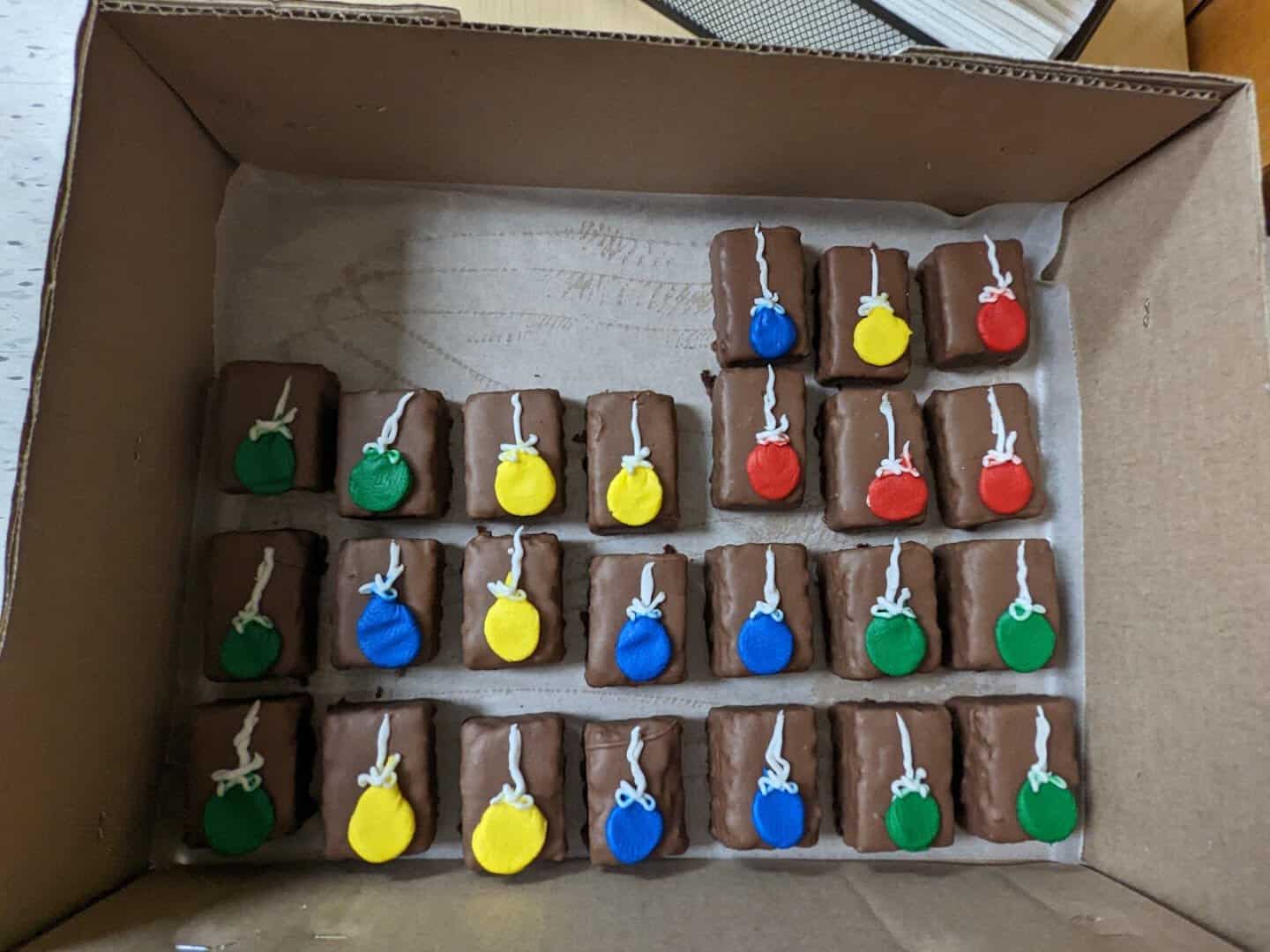 A box of chocolate petit fours from Moeller's Bakery in Houston